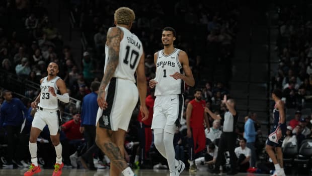 Jan 29, 2024; San Antonio, Texas, USA; San Antonio Spurs center Victor Wembanyama (1) smiles at San Antonio Spurs forward Jeremy Sochan (10) in the second half against the Washington Wizards at Frost Bank Center.
